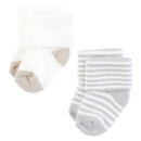 Organic terry baby socks in beige and white colors, featuring neutral stripes and foldable cuffs.