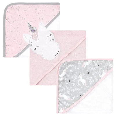 Three cotton rich hooded towels featuring a pink unicorn design, stars, and a gray unicorn pattern, ideal for babies.