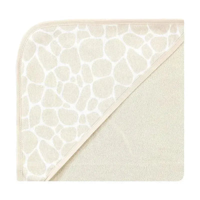 Cotton-rich hooded towel featuring a cream color with a gentle giraffe skin print, ideal for infants.