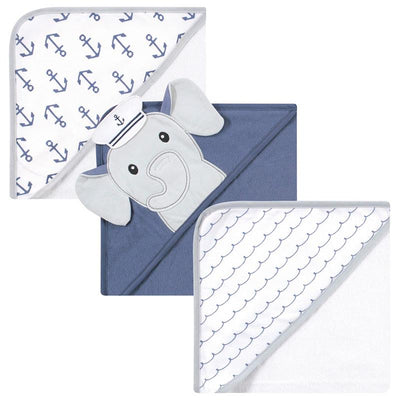 Three hooded towels designed for infants, featuring a sailor elephant, anchor, and wave patterns in cotton.