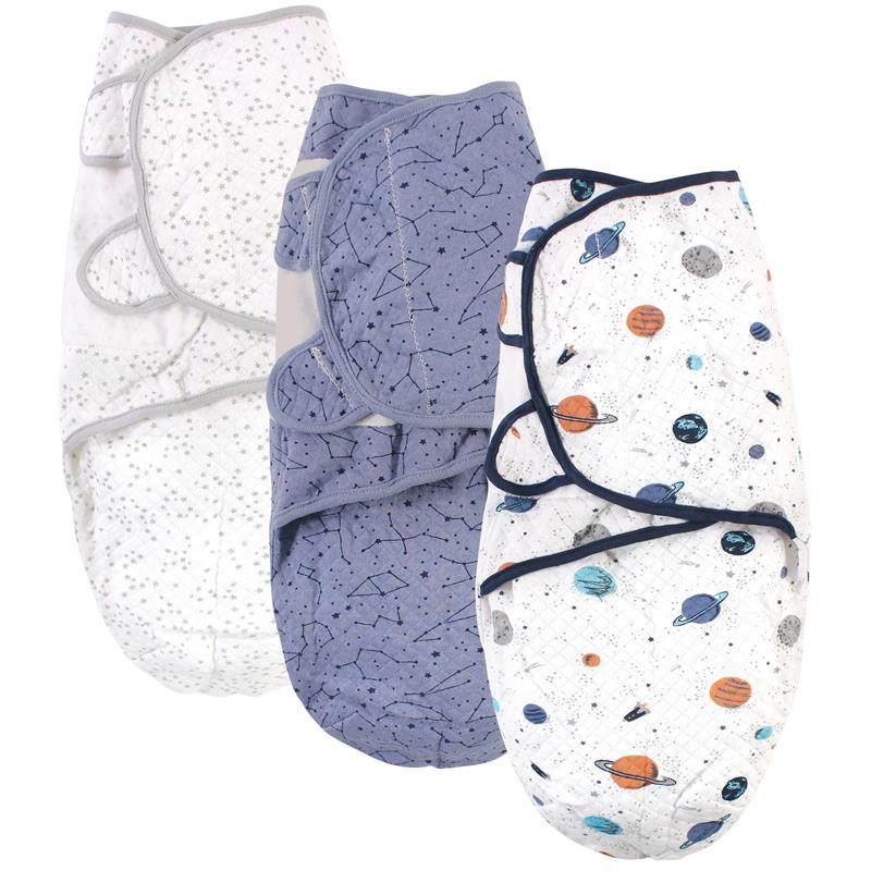 Three quilted cotton swaddle wraps for babies, featuring celestial designs like stars and planets in soft colors.