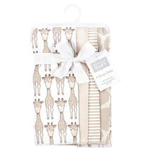 Four-pack of cotton flannel burp cloths featuring giraffe patterns and a neutral color palette, tied with a ribbon.