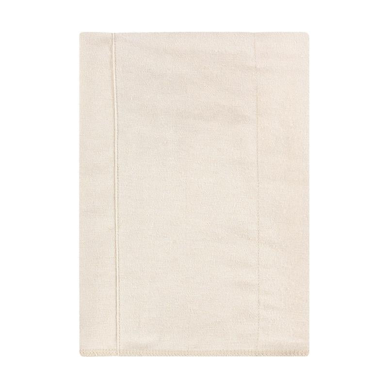 Cotton flannel burp cloth in a beige color, designed for babies, soft and absorbent for cleaning after feeding.