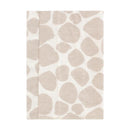 Cotton flannel burp cloth featuring a giraffe print design in soft beige tones.