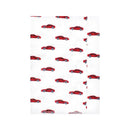 Flannel burp cloth featuring a playful pattern of red cars on a white background, designed for baby use.