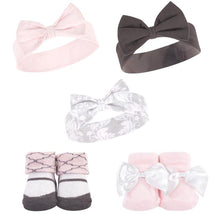 Unisex baby headband and socks set featuring three headbands with bows and two pairs of matching socks.