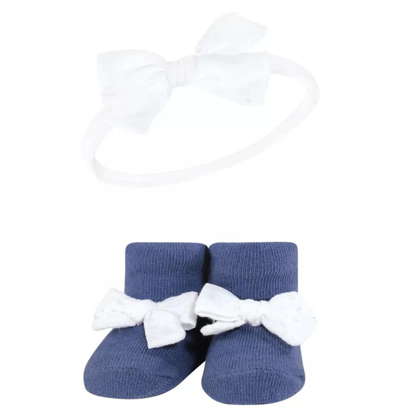 Navy gingham headband with a white bow above matching navy socks with white bows at the front, part of a 6-pack set.