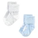 Cotton-rich newborn socks in blue and white, featuring a star design and textured fabric, suitable for ages 12-24 months.