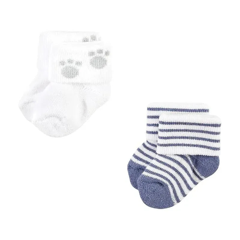 Baby Vision Grow With Me Socks, 12-pack, featuring white socks with paw prints and navy striped socks.