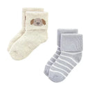 Soft, cozy socks in a pack of 12 featuring a beige pair with a dog graphic and gray-striped designs.