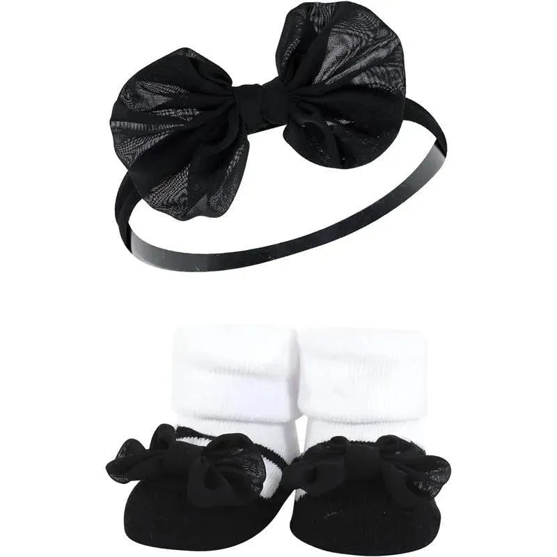 Gift set featuring a black lace bow headband and matching black and white baby socks with bows.