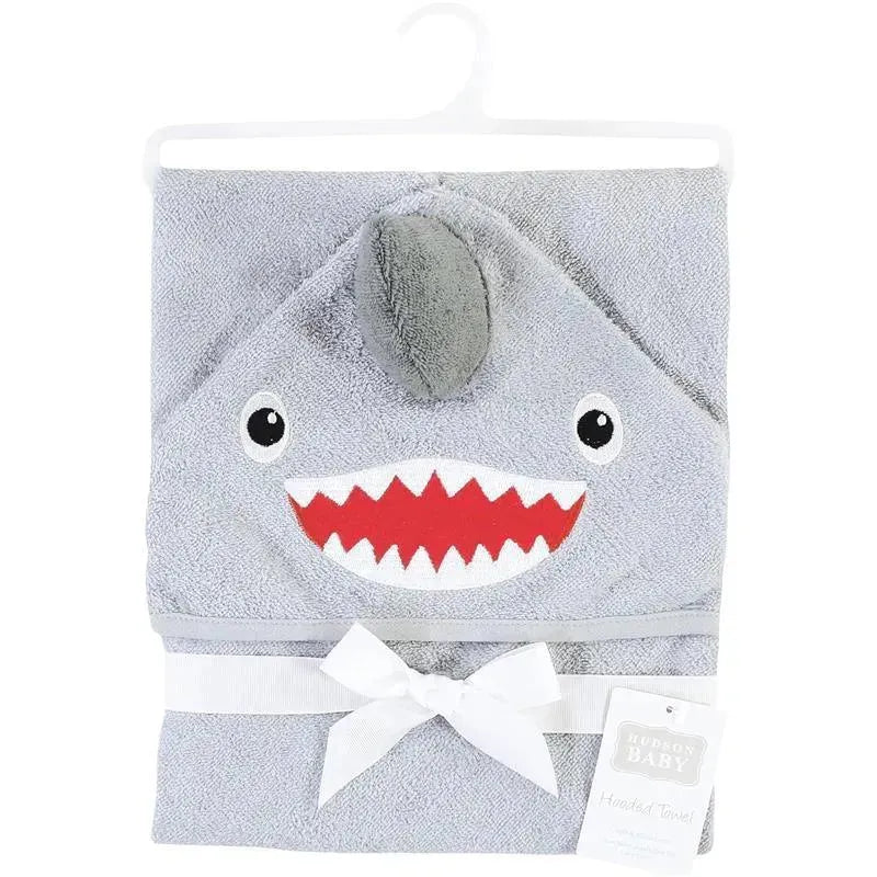 Hooded towel featuring a cute shark face design, made of soft cotton, ideal for drying babies after bath time.