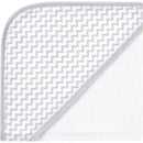 Hooded baby towel featuring a soft white body and a gray zigzag patterned hood. Ideal for bath time.