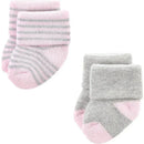 Ballet-themed newborn socks for baby girls, featuring pink and gray colors with striped details, suitable for ages 6-12 months.