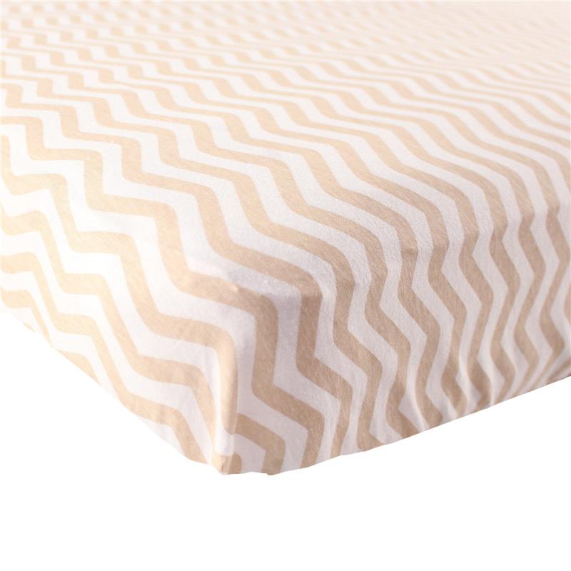 Fitted crib sheet in tan chevron pattern, designed for babies; soft and snug fit for crib mattresses.