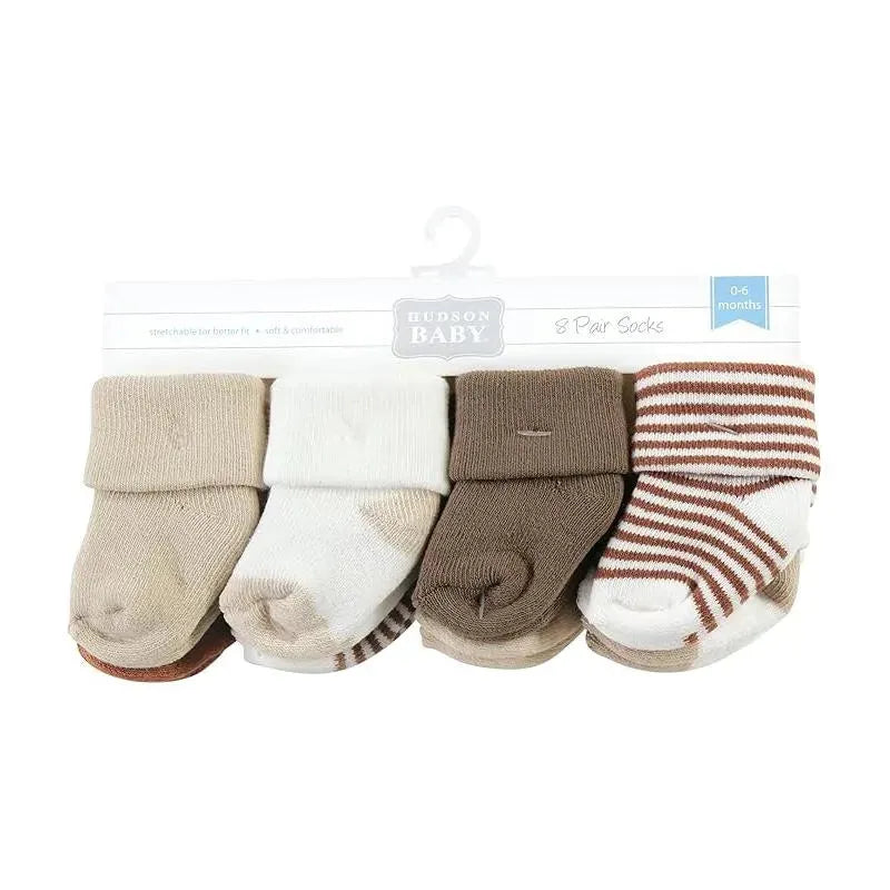 Eight pairs of neutral brown baby socks, featuring various patterns including solid colors and stripes, packaged for ages 0-6 months.