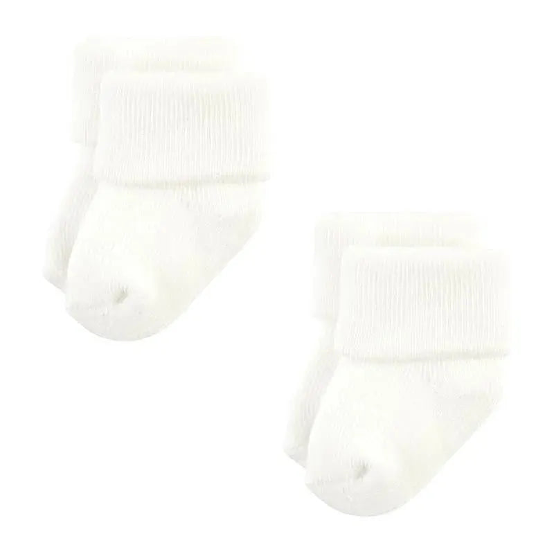 Set of two pairs of baby socks in solid beige and brown colors, featuring a soft, ribbed texture and rolled cuffs.