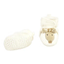 Baby Vision giraffe-themed booties featuring a soft cream color, snug design, and a decorative giraffe face.