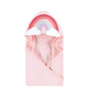 Hooded baby towel in pink with a rainbow design and cloud accents on the hood, suitable for infants.