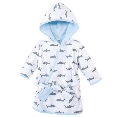 Unisex baby bathrobe in white with a shark pattern, featuring a hood and belt. Soft cotton, ideal for post-bath wear.