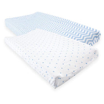 Fitted baby changing pad covers in blue chevron and white with blue stars, designed for unisex use.