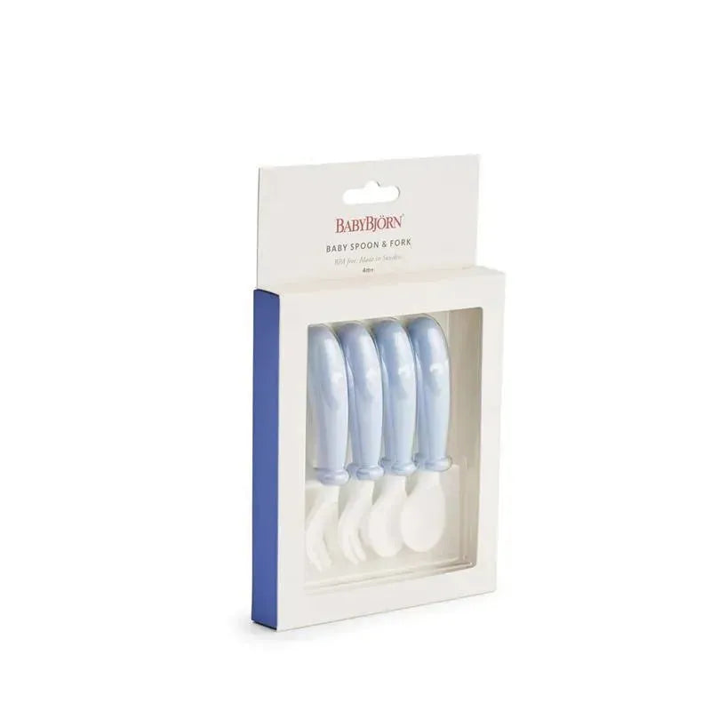 BabyBjorn Baby Spoon and Fork set in powder blue, including four pieces with ergonomic design for easy handling.