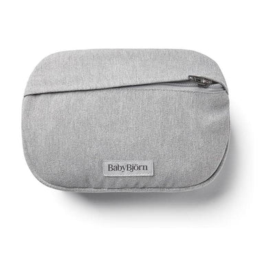 Light gray BabyBjörn Pocket Pouch for Baby Carrier, featuring a zippered closure and branded label.