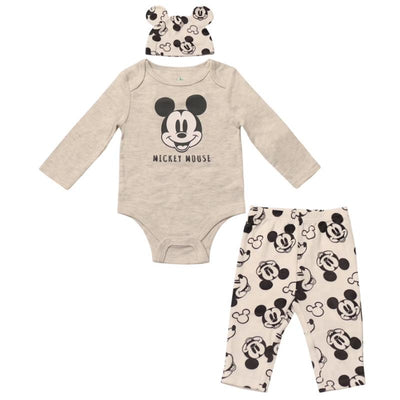 Light grey baby bodysuit with a large Mickey Mouse print, matching pants with Mickey faces, and a Mickey-themed hat.