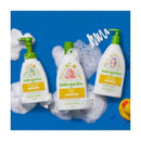 Babyganics Bubble Bath Chamomile Verbena, 9 Oz, alongside foaming shampoo and moisturizing lotion, set against a blue background with bubbles.