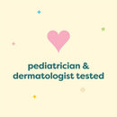 Pediatrician and dermatologist tested label with a pink heart and colorful stars on a light yellow background.