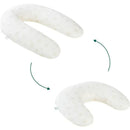 Organic 2-in-1 pregnancy pillow and nursing cushion, curved design in soft white with a subtle pattern.