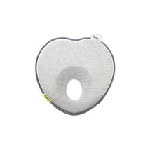 Heart-shaped baby cushion in smokey gray, featuring a central opening for head support.