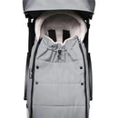 Babyzen Yoyo Footmuff in stone color, featuring a zippered enclosure and soft, plush interior for baby comfort.