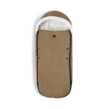 Babyzen Yoyo Footmuff in Toffee color, featuring a soft fleece interior and button closures for added warmth and comfort.