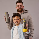 Child smiling while holding a Batman-themed Tritan drink bottle, with an adult behind holding a gray BBoox water bottle.