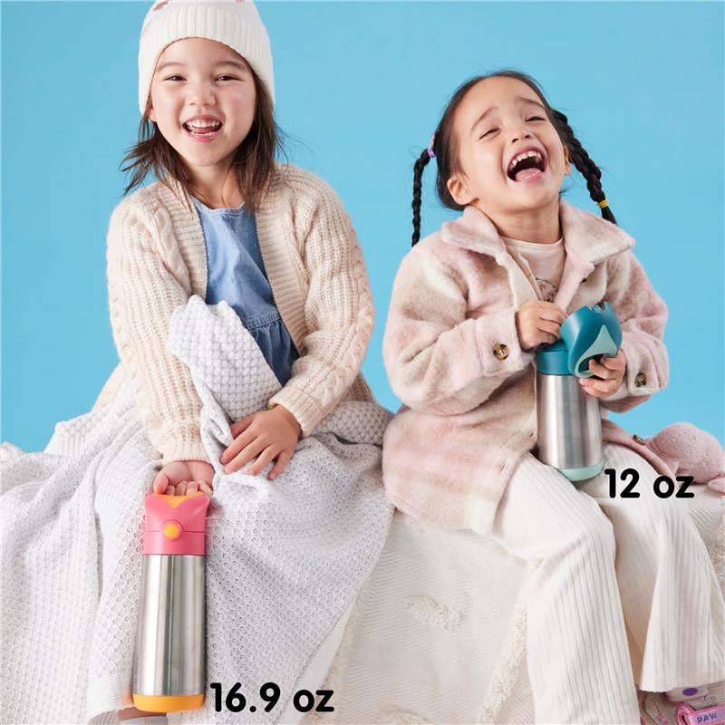 Two young girls sit together, smiling and holding insulated drink bottles, one labeled 16.9 oz with a pink top, the other 12 oz with a teal top.