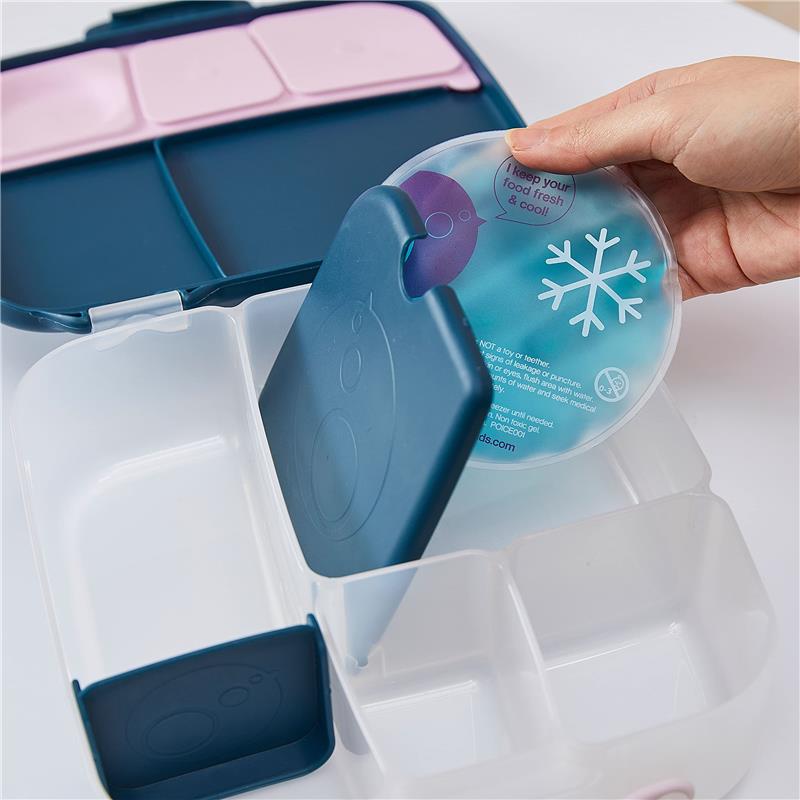 Gel cooler from the Bbox Twin Pack is being placed into a divided food storage container to keep food fresh.