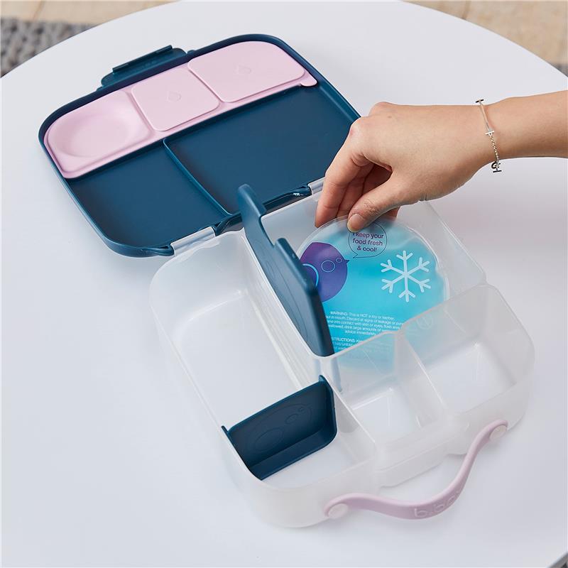 Bbox Gel Cooler Twin Pack with a hand placing a cooling insert into a divided, clear storage container.