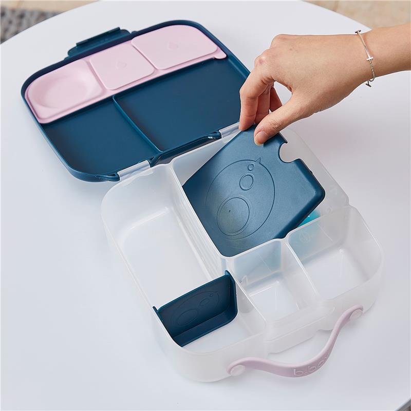 Bbox Gel Cooler Twin Pack with a hand placing a blue gel pack into a divided container, featuring pink and blue compartments.