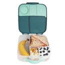 Lunchbox Emerald Forest by b.box, featuring a sandwich, banana, yogurt with blueberries, popcorn, and compartments for snacks.