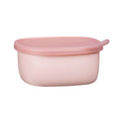 Silicone lunch tub in a berry color, featuring a pink lid and a rounded rectangular shape for meal storage.