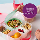 Silicone lunch tub with flexible lid, featuring sections for pasta salad, yogurt, fruits, and snacks, held by a hand.