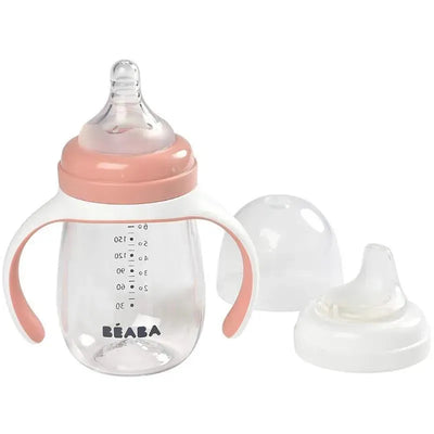 Beaba 2-in-1 Bottle to Sippy Learning Cup in rose color, with ergonomic handles and interchangeable tops.