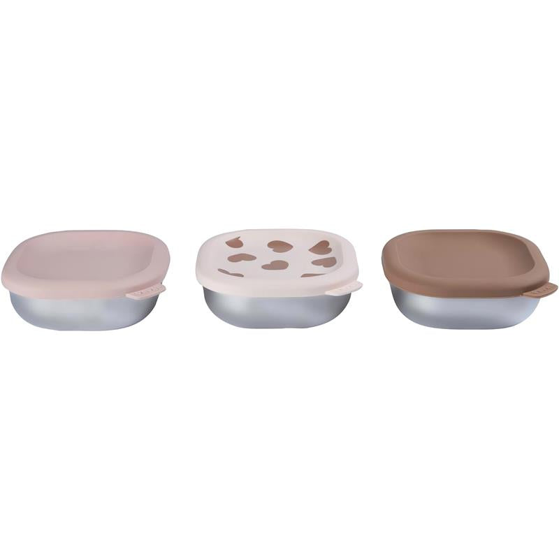 Three Beaba stainless steel baby bowls in pastel colors, featuring secure silicone lids, designed for feeding infants.