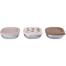 Three Beaba stainless steel baby bowls in pastel colors, featuring secure silicone lids, designed for feeding infants.