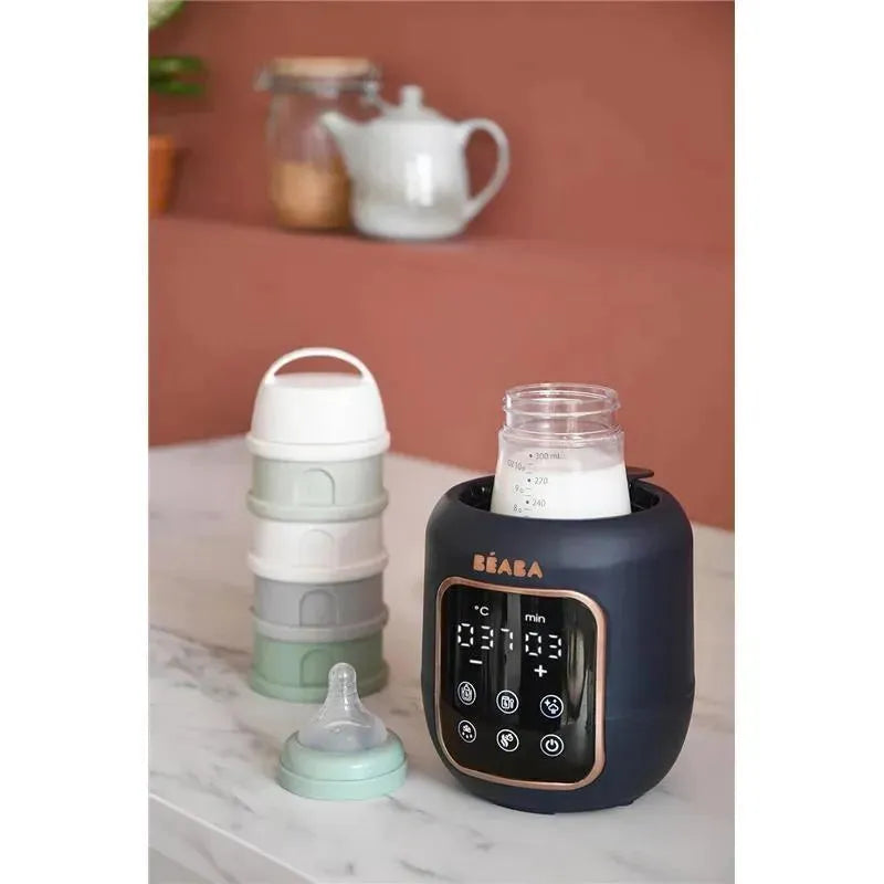 5-in-1 Beaba Multi Milk Baby Bottle & Food Warmer in midnight color, with digital display, surrounded by baby bottles and containers.