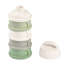 Beaba Formula Snack Container in sage, featuring stackable compartments in green, gray, and white, with a matching lid.