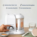 Babycook Solo 4 in 1 Baby Food Maker in rose gold with a stainless steel water tank and mixing blade, featuring one-handed operation.