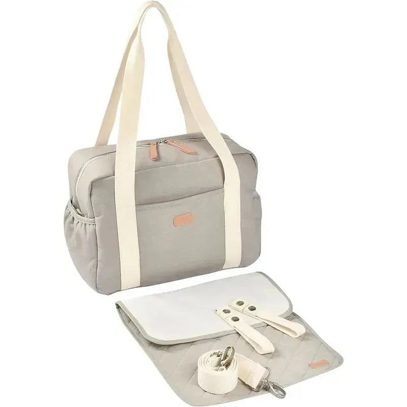 Gray Beaba Paris diaper bag with large capacity, featuring sturdy straps and a coordinating changing mat.