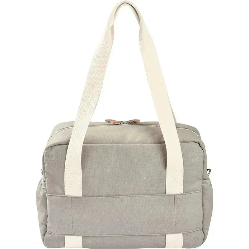 Gray Beaba Paris diaper bag with large capacity, featuring durable straps and a zippered closure.